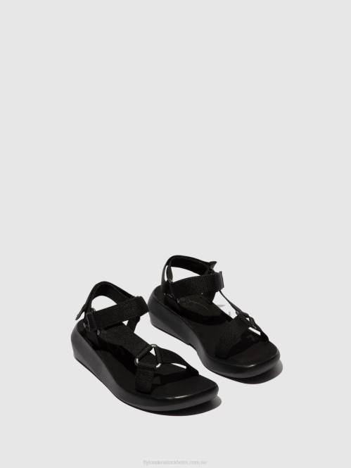 sandaler med t-band brek840 kvinnor Fly London 2T02581 svart