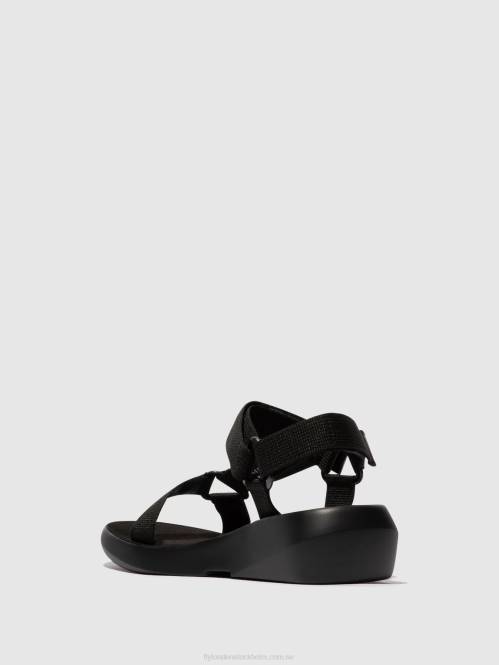 sandaler med t-band brek840 kvinnor Fly London 2T02581 svart